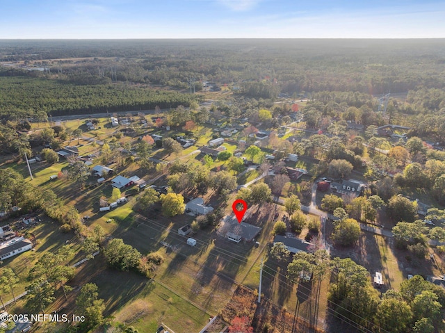 aerial view with a wooded view