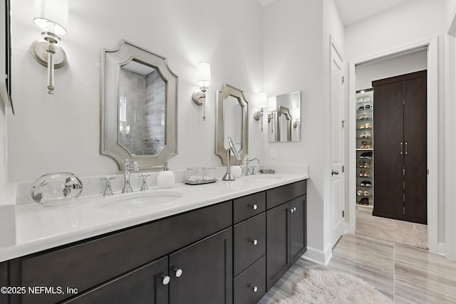 bathroom with double vanity and a sink