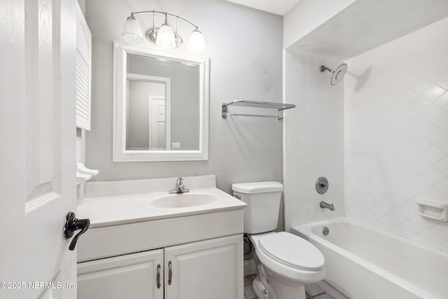 bathroom featuring toilet, bathtub / shower combination, and vanity