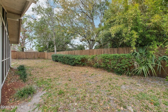 view of yard featuring a fenced backyard