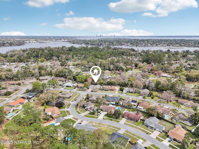 bird's eye view featuring a residential view and a water view