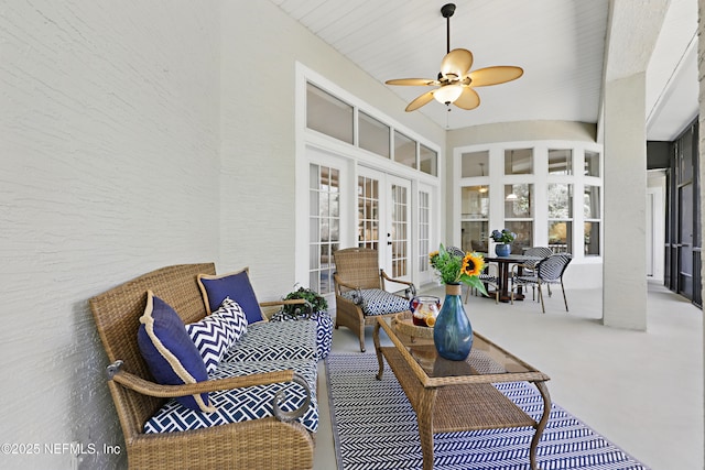 exterior space with french doors and a ceiling fan