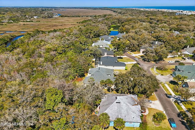 aerial view with a residential view and a water view