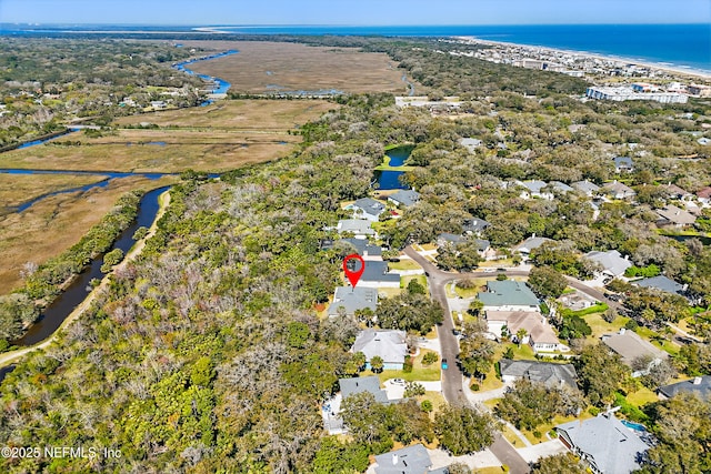 aerial view featuring a residential view and a water view