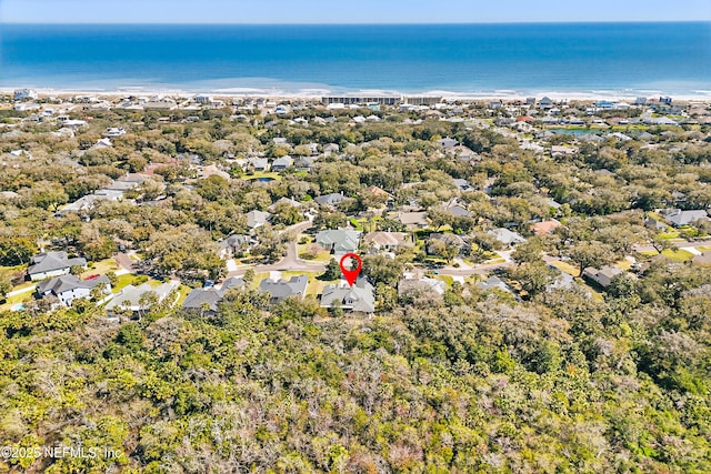 bird's eye view featuring a residential view and a water view