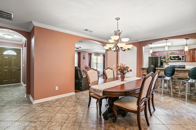 dining area featuring arched walkways, light tile patterned flooring, and visible vents