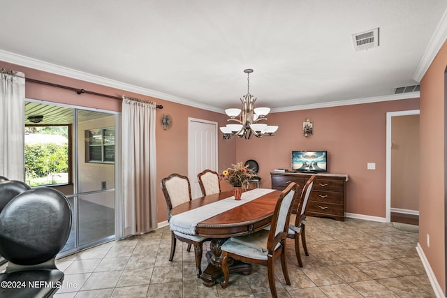 dining area featuring a chandelier, ornamental molding, visible vents, and baseboards