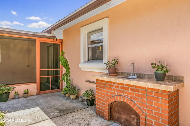 view of patio / terrace with a sink