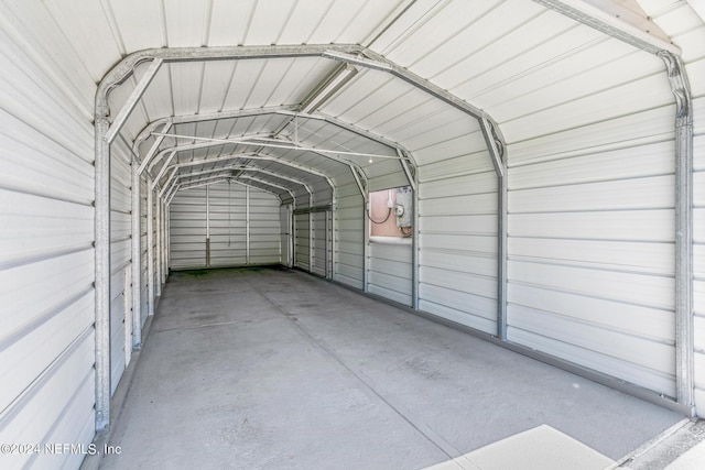 garage with a detached carport