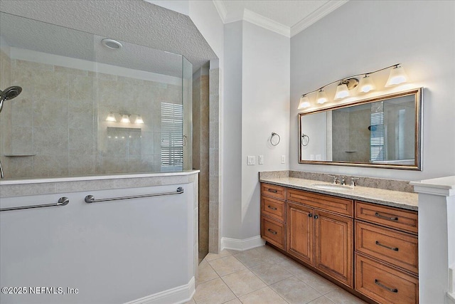 full bathroom with crown molding, vanity, a walk in shower, tile patterned flooring, and baseboards