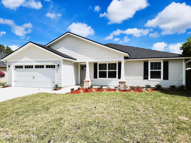 view of front facade featuring a garage, concrete driveway, a front lawn, and roof with shingles