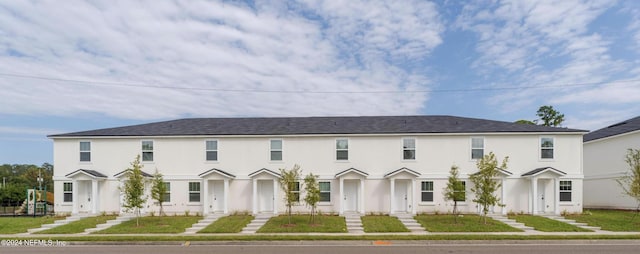 multi unit property featuring stucco siding