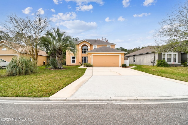 traditional home with a garage, a front yard, concrete driveway, and stucco siding