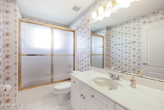 full bath with visible vents, wallpapered walls, toilet, vanity, and tile patterned floors