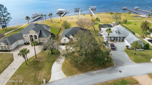 aerial view featuring a water view and a residential view