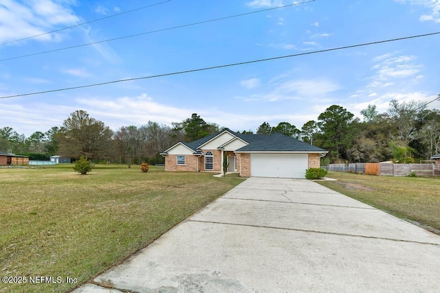 ranch-style house with brick siding, an attached garage, fence, driveway, and a front lawn