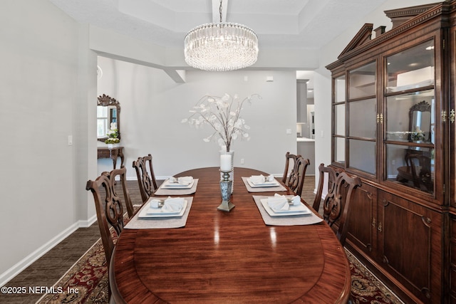 352 Bronson Pkwy, Saint Augustine, FL 32095 - dining area featuring dark wood-style flooring and a chandelier