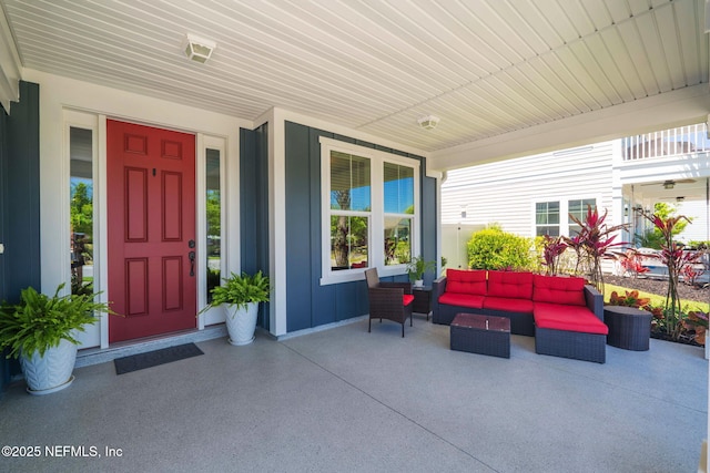 352 Bronson Pkwy, Saint Augustine, FL 32095 - view of exterior entry featuring an outdoor hangout area, a porch, and board and batten siding