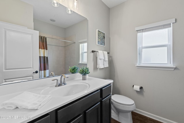 352 Bronson Pkwy, Saint Augustine, FL 32095 - full bath featuring vanity, wood finished floors, and a shower with shower curtain