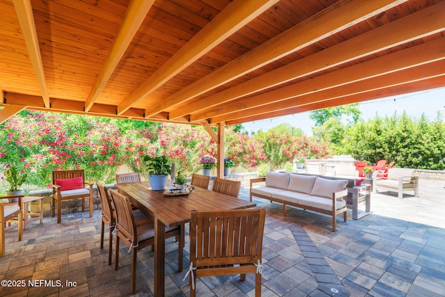 352 Bronson Pkwy, Saint Augustine, FL 32095 - view of patio / terrace with outdoor dining space and an outdoor hangout area