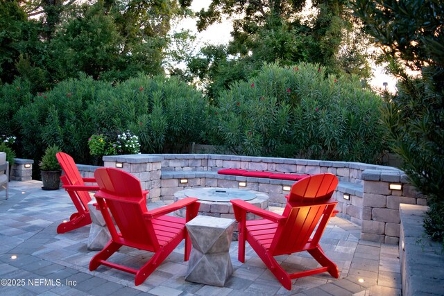 352 Bronson Pkwy, Saint Augustine, FL 32095 - view of patio / terrace featuring a fire pit