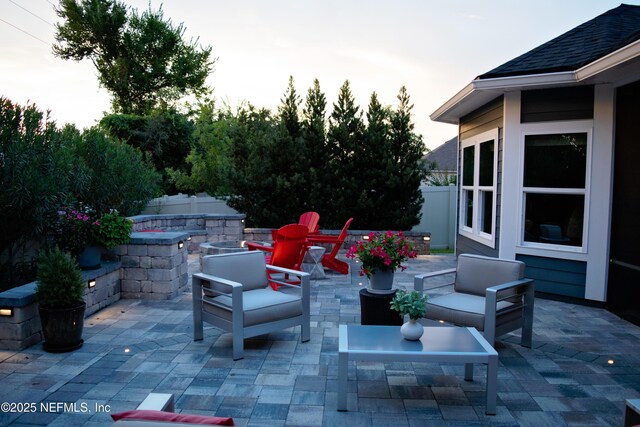 352 Bronson Pkwy, Saint Augustine, FL 32095 - patio terrace at dusk featuring a patio area and an outdoor living space