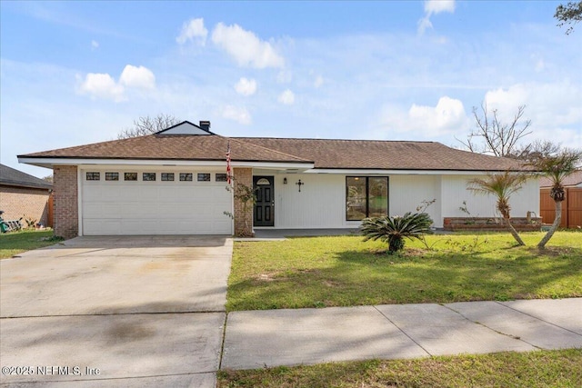 ranch-style home featuring an attached garage, a front lawn, concrete driveway, and brick siding