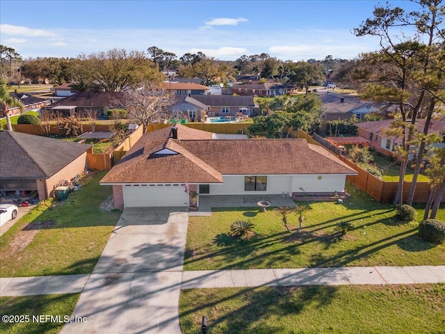 drone / aerial view with a residential view