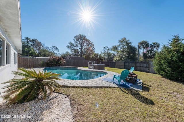 view of pool featuring a fenced backyard, a fenced in pool, and a yard