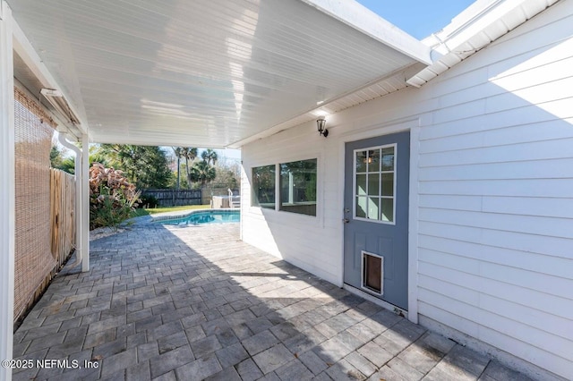 view of patio with a fenced in pool and a fenced backyard