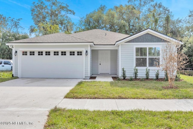 ranch-style house featuring concrete driveway, a front lawn, an attached garage, and a shingled roof