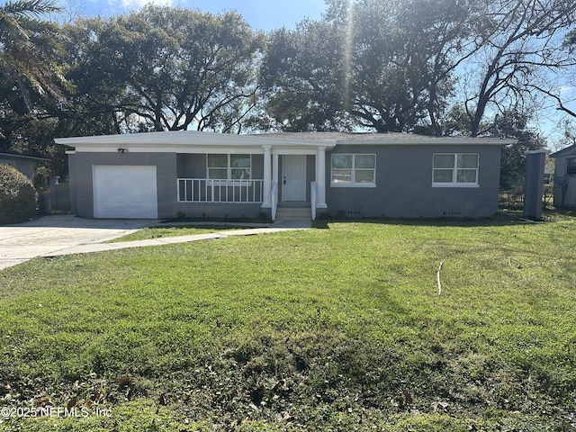 ranch-style house featuring covered porch, brick siding, an attached garage, and a front lawn