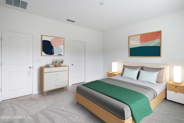 carpeted bedroom featuring visible vents