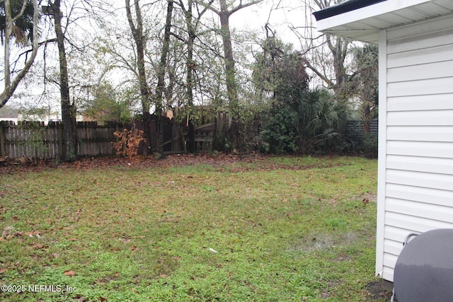 view of yard featuring a fenced backyard