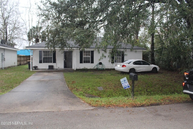 ranch-style house with a front yard