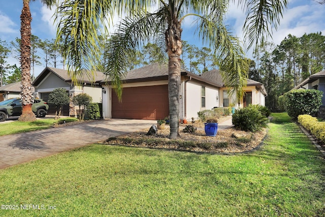 ranch-style house with a garage, a front lawn, decorative driveway, and stucco siding