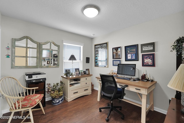 office space with a textured ceiling, baseboards, and dark wood-style flooring