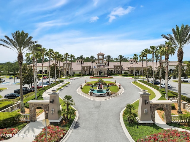 view of home's community with a residential view and curved driveway