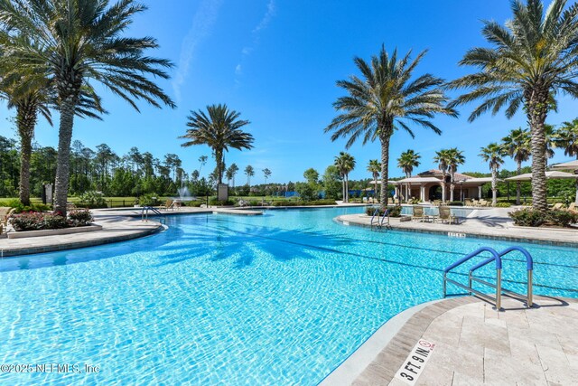 pool with a patio