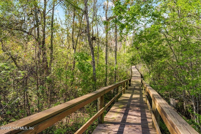 dock area with a wooded view