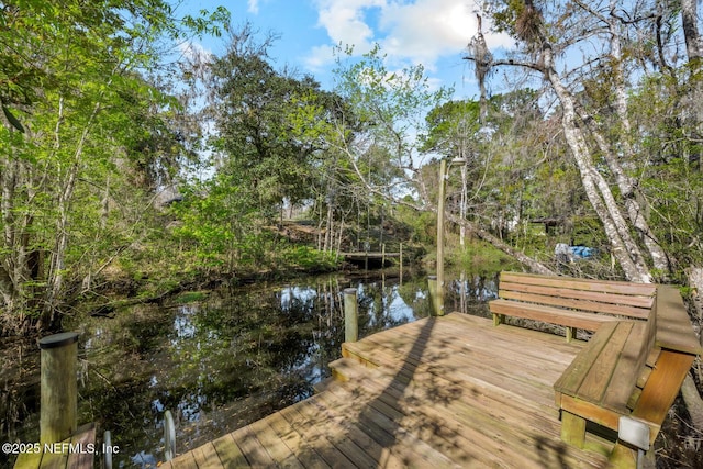 view of dock with a water view