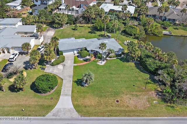 aerial view with a water view and a residential view