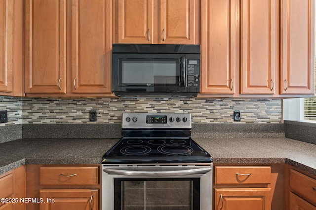 kitchen with black microwave, dark countertops, stainless steel electric range, and backsplash