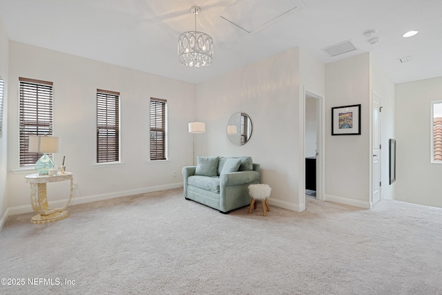 sitting room with carpet floors, baseboards, a notable chandelier, and recessed lighting