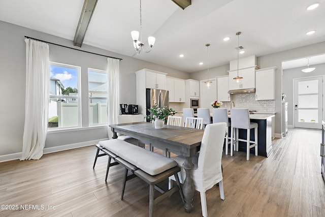 dining area featuring vaulted ceiling with beams, light wood finished floors, recessed lighting, a chandelier, and baseboards