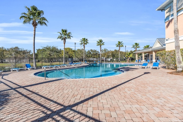 4920 Key Lime Dr Unit 305, Jacksonville, FL 32256 - community pool featuring a patio area