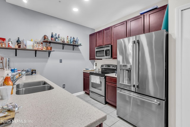 4920 Key Lime Dr Unit 305, Jacksonville, FL 32256 - kitchen with appliances with stainless steel finishes, dark brown cabinets, open shelves, light tile patterned flooring, and recessed lighting