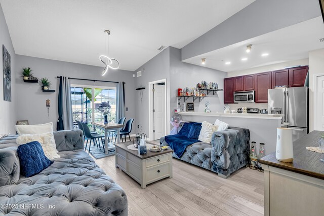 4920 Key Lime Dr Unit 305, Jacksonville, FL 32256 - living room with light wood finished floors