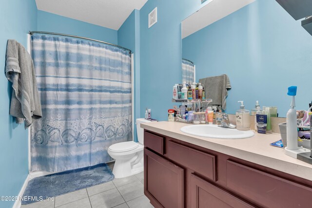 4920 Key Lime Dr Unit 305, Jacksonville, FL 32256 - full bathroom featuring tile patterned flooring, vanity, and a shower with shower curtain