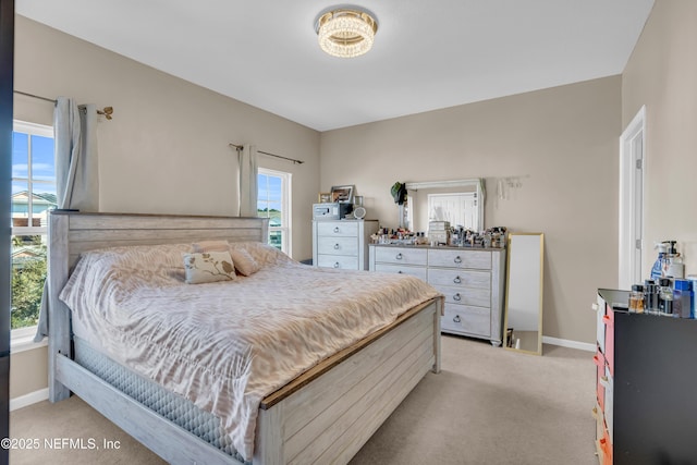 4920 Key Lime Dr Unit 305, Jacksonville, FL 32256 - bedroom with light colored carpet and baseboards